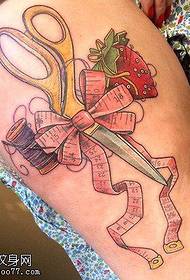 Woman's Leg Scissors Bow Strawberry Tattoo Works by Tattoo Show