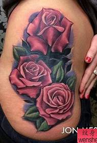 Woman side waist color rose tattoo pattern
