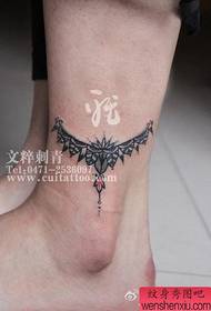 Modellu di tatuatu di vigna populari chjucu