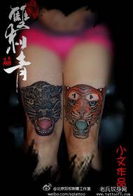 Modello di tatuaggio testa di tigre e testa di leopardo per gambe di ragazze
