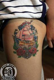 Female legs color sailboat rose tattoo pattern