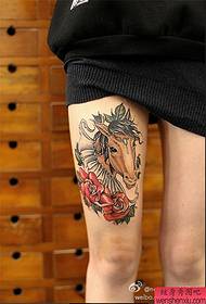 Leg color horse tattoo work