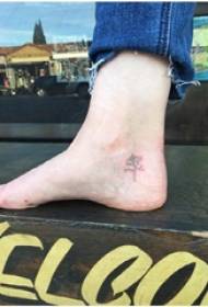 Plant Tattoo Boy's Feet on Black Plant Tattoo Picture