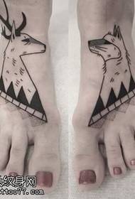 dier tattoo patroon op de voet