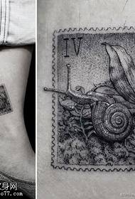 snail tattoo pattern on the ankle