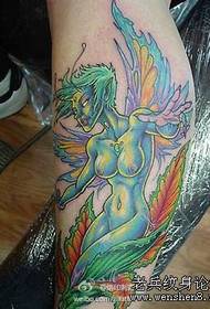 kojos spalvos elfo sparno tatuiruotė