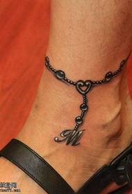 Iphethini ye tattoo ye-anklet