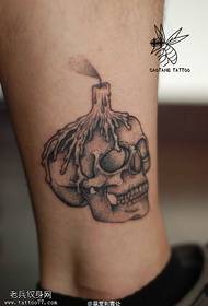 modello del tatuaggio del cranio della caviglia del cranio