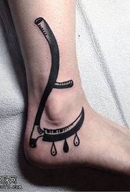 шљокица узорак тетоваже на зглобу