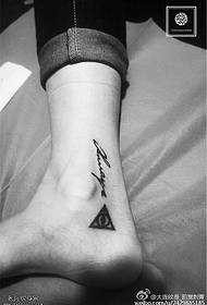 Triangle character tattoo on the ankle