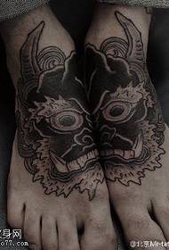 pūķa mazuļa tetovējuma raksts uz pēdas