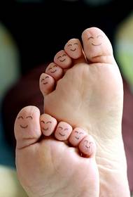 Cute Simple Smiley Tattoo on Toe