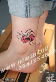 Bell Tattoo on the Ankle