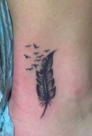 small feather tattoo pattern on the foot