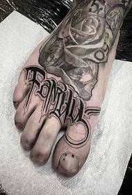 Modèl tatoo angle sou pye an