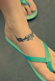 kauneus jalka totem tatuointi
