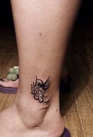 disegno tatuaggio gamba: disegno tatuaggio farfalla totem gamba