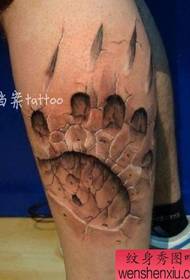 E Steen gekrackten Effekt op de Been Bear Paw Print Tattoo