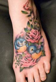pola tato bunga burung kaki yang indah