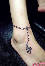 incwadi yokudala ye-anklet tattoo isithombe