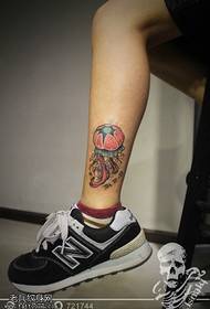 isithombe se-ankle color jellyfish tattoo