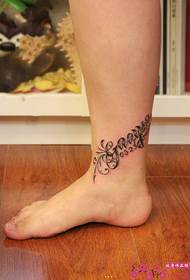 Flower English design ankle tattoo isithombe