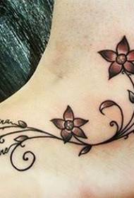 ge en vacker blommig tatuering Mönsterbild