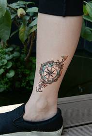kreativna slika cvjetne loze kompas tetovaža gležnja