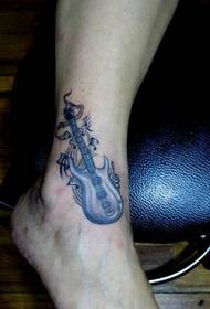 patrún tattoo dord giotár a bhfuil an-tóir air