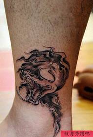 ankle-scarred snake tattoo works