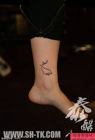 woman's foot simple cute sea whale tattoo pattern