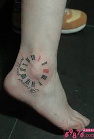 kūrybinis laikrodžio kulkšnies tatuiruotės paveikslėlis