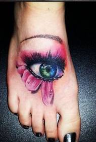 preporučio jednu sliku Instep eye tattoo pattern