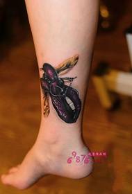 big lips beetle creative ankle tattoo picture