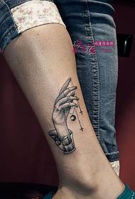 Image de tatouage créatif à la cheville