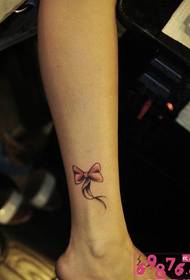 розовый маленький лук татуировки лодыжки
