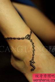 female ankles and small anklet tattoo pattern