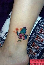 beautiful and beautiful color butterfly tattoo pattern at the girl's ankle