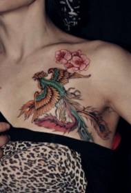 女性小臂漂亮的火凤凰花朵纹身图案