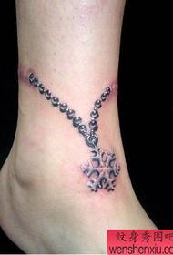 model de tatuaj cu lanț agățat: floare de nea picior agățat model de tatuaj lanț agățat