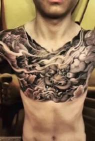 9 bei disegni di tatuaggi di grandi 9 uomini tatuati