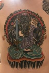 Таттоо трострука лица Буде мушке груди у боји Будова тетоважа слика