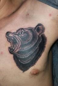 Tatuaje pecho hombre chico pecho oso negro tatuaje foto