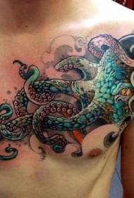 pulpo negro y verde en el pecho con patrón de tatuaje de ojo naranja