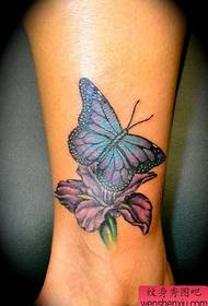 tattoo: ຂໍ້ຕີນຮູບຜີເສື້ອ butterfly lily