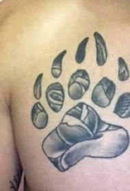 foto tatuaggio orso zampa maschio petto nero orso zampa tatuaggio