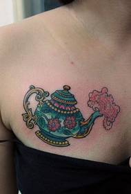 tatuagem de beleza no peito bule mágico