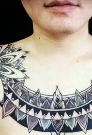 chest and shoulder one personality totem tattoo picture