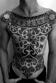Tótem tribal masivo en el pecho y el abdomen patrón decorativo del tatuaje
