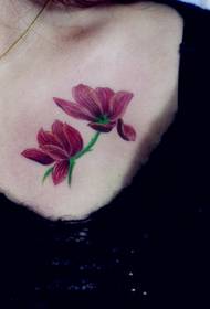 female chest flower tattoo